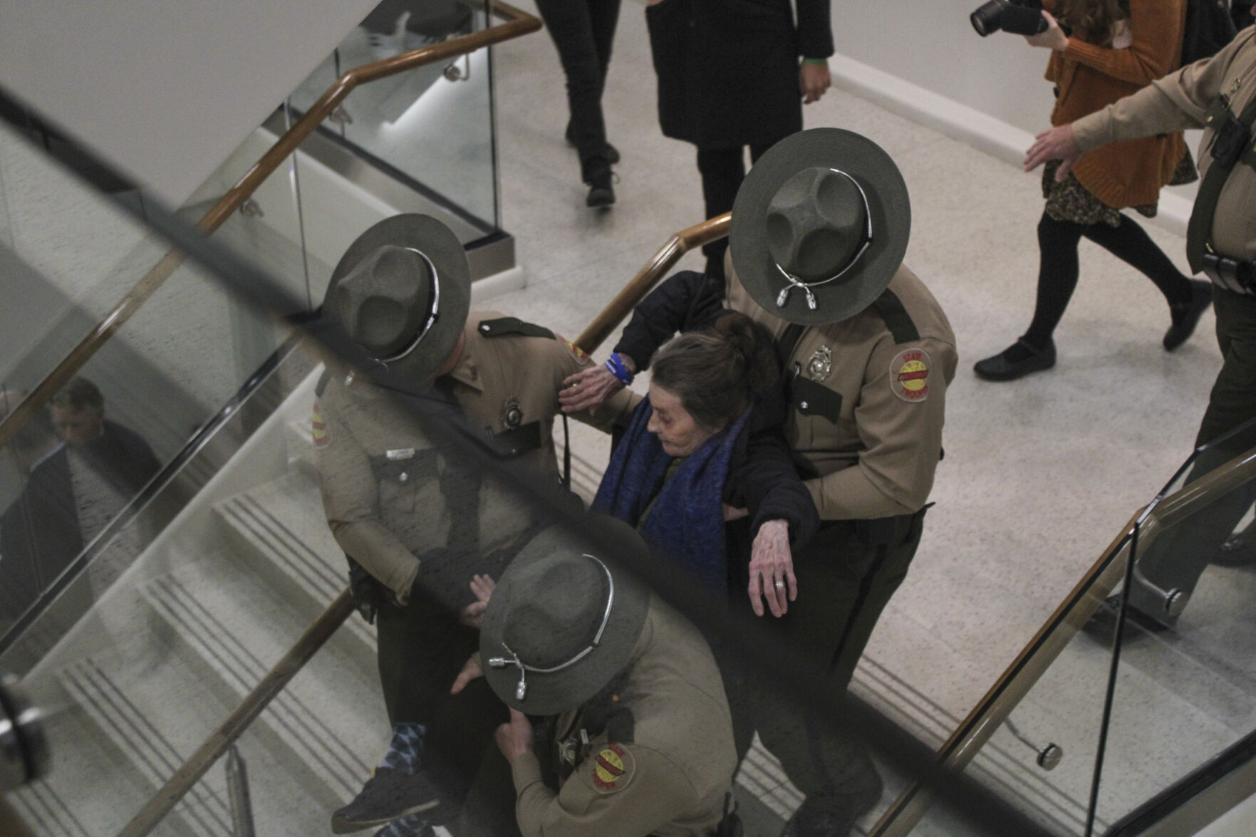 Protester Arrested as Lawmakers Debate Bill Targeting Undocumented Students